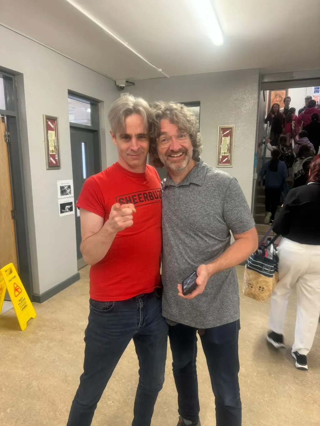 Instructor and participant fist bump