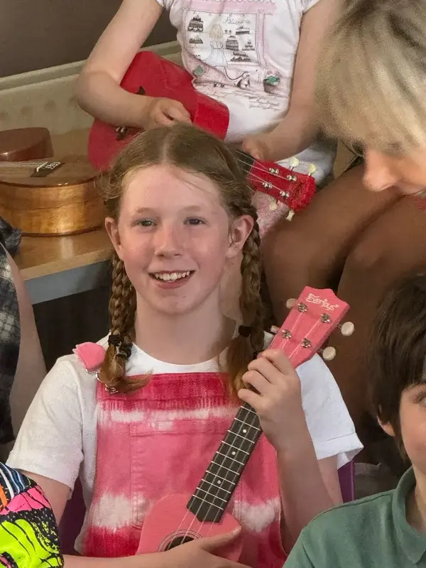 Student with a ukulele